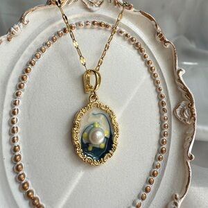 Anthropologie Gold and Blue Cameo Necklace